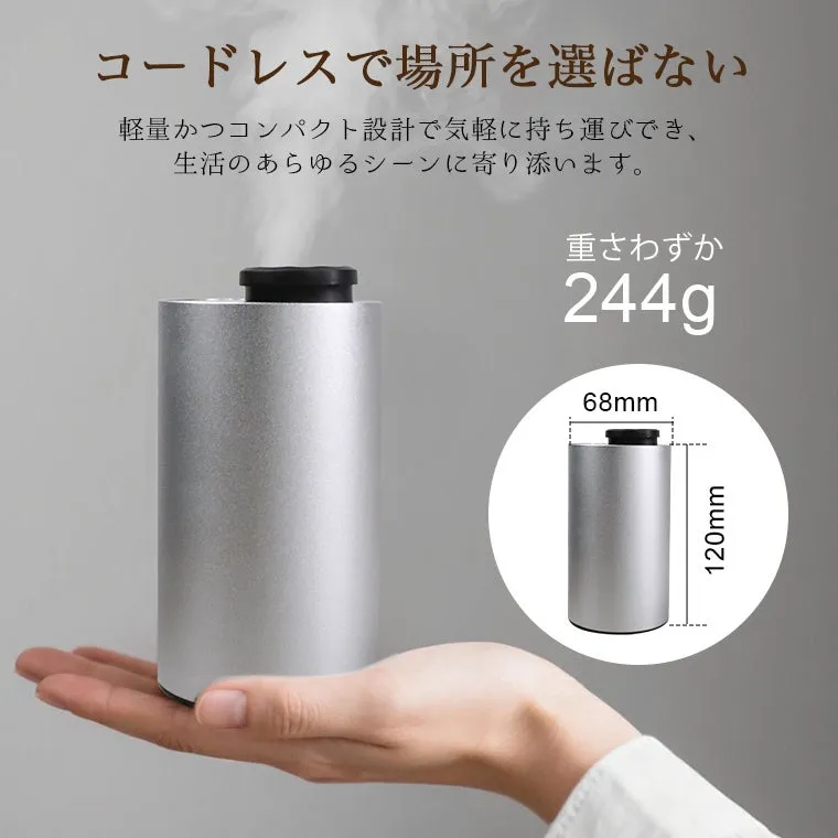 コードレス加湿器の製品画像。シルバーの本体で、コンパクトなデザイン。製品のサイズと重さの記載がある。