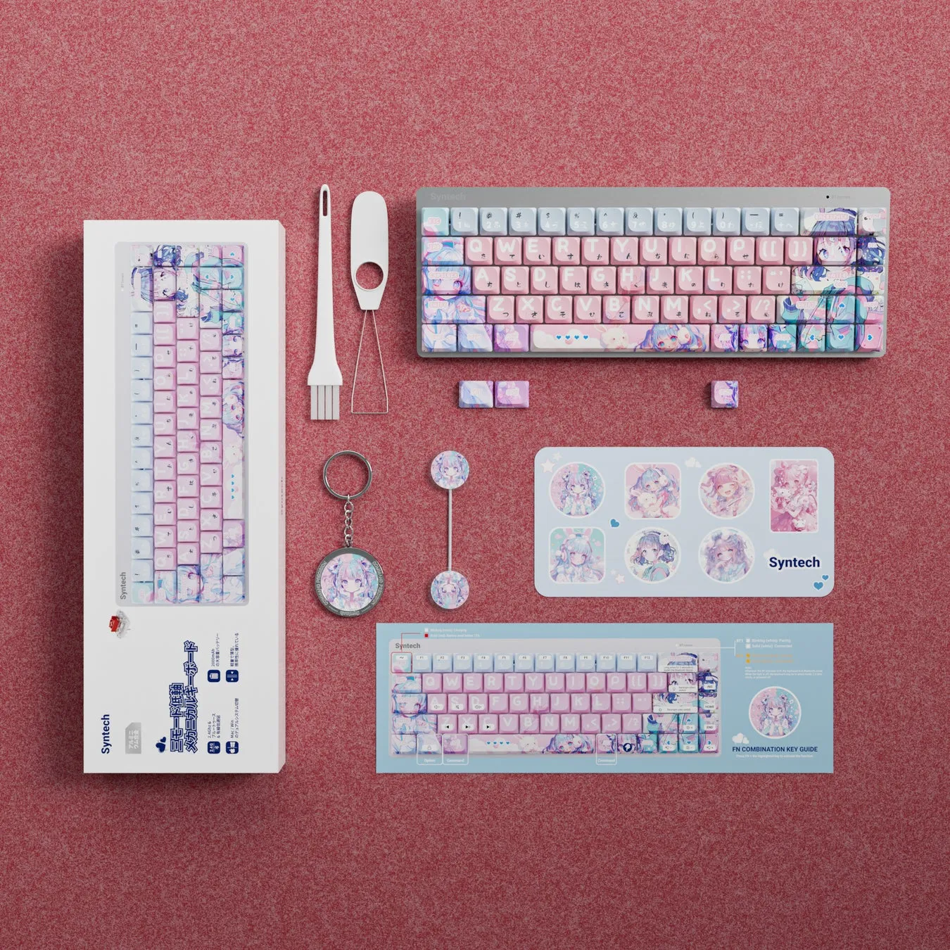 ピンクと白を基調としたメカニカルキーボードのセット。キーボード本体、キーキャップ、クリーニングツール、キーホルダー、ステッカー、説明書などが含まれる。