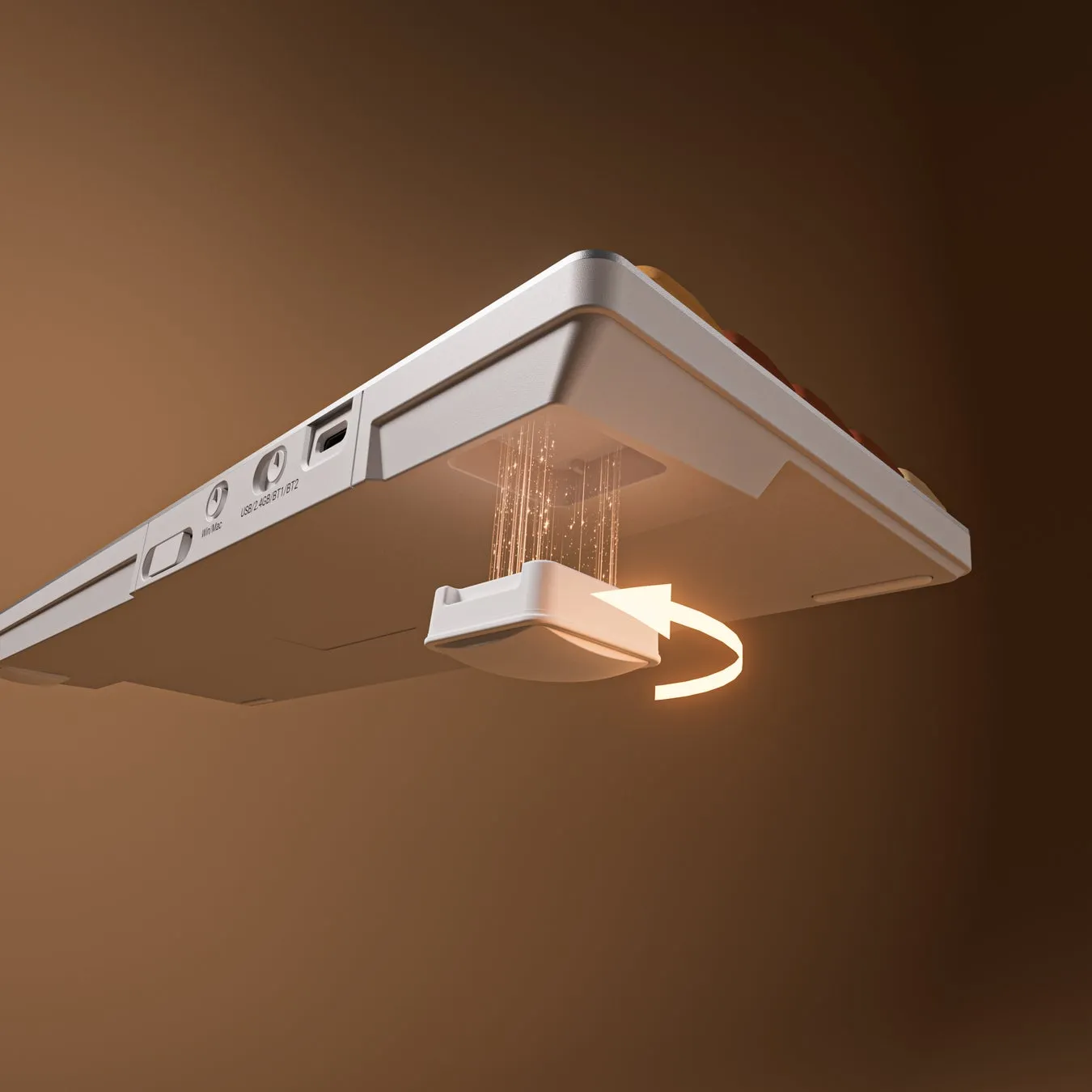 キーボードの側面と、そこから光が放射される様子。